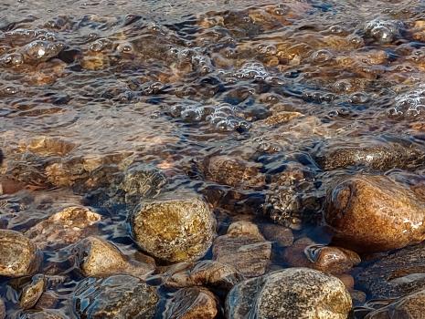 A group of rocks in water Photograph courtesy of Karin Helwig A group of rocks in water Photograph courtesy of Karin Helwig