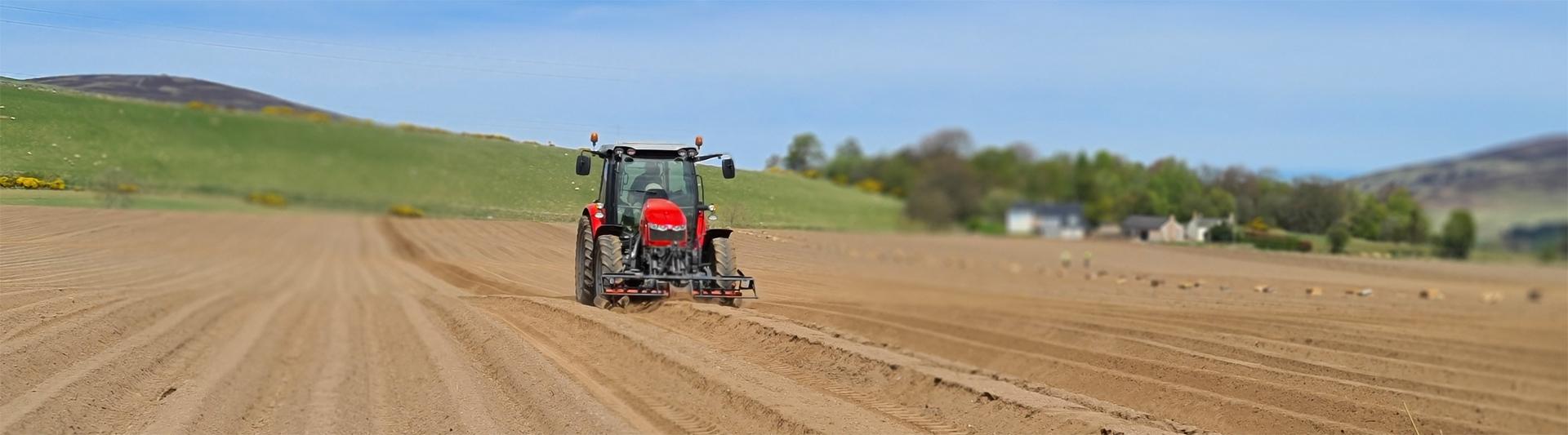Tractor in a field. Photo credit: James Hutton Institute