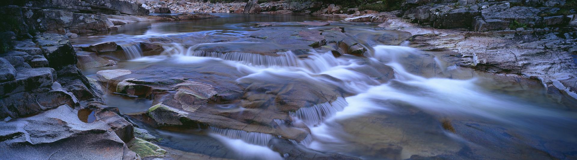 Water running over rocks, Glen Etive. Photo credit: Jeremy Walker. Source: Getty Images