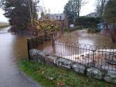 Flooded Property and road. Photo Credit: Rachel Helliwell 