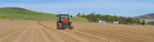 Tractor in a field. Photo credit: James Hutton Institute