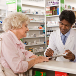 Pharmacist advising patient Image of pharmacist advising patient