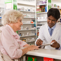 Image of pharmacist advising patient