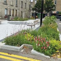 Residential Street with community runoff retention solutions - Photo Credit: Abertay University