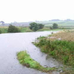 Cover photograph courtesy of: Mark Wilkinson (Belford catchment, Northumberland offline storage  pond in action during a flood)