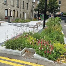 Residential Street with community runoff retention solutions - Photo Credit: Abertay University