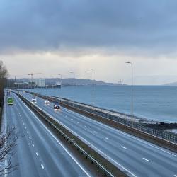View of a road alongside the River Clyde. Photo credit: Anishka Cameron