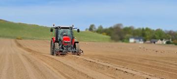 Tractor in a field. Photo credit: James Hutton Institute